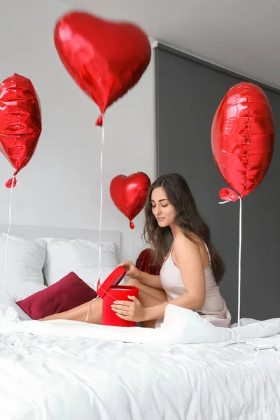 Beautiful Young Woman Opening Gift Valentine Day Bed Morning — Stock Photo, Image