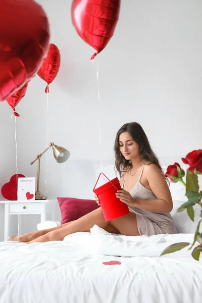 Beautiful Young Woman Opening Gift Valentine Day Bed Morning — Stock Photo, Image