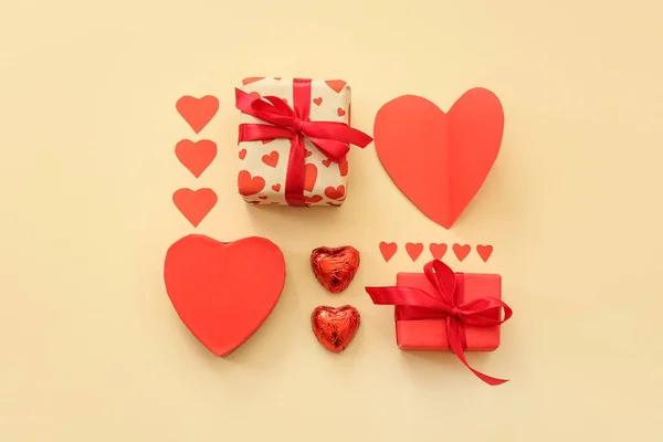 Beautiful Composition Gift Boxes Paper Hearts Candies Beige Background Valentine — Stock Photo, Image