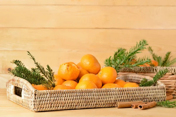 Wicker Tray Tangerines Fir Branches Cinnamon Wooden Background — Stock Photo, Image