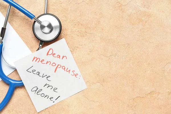 Sticky Note Text Dear Menopause Leave Alone Stethoscope Beige Background — Stock Photo, Image