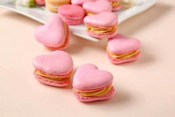 Tasty Heart Shaped Macaroons Beige Background Closeup — Stock Photo, Image