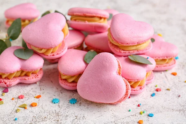 Tasty Heart Shaped Macaroons Sprinkles Light Background Closeup — Stock Photo, Image