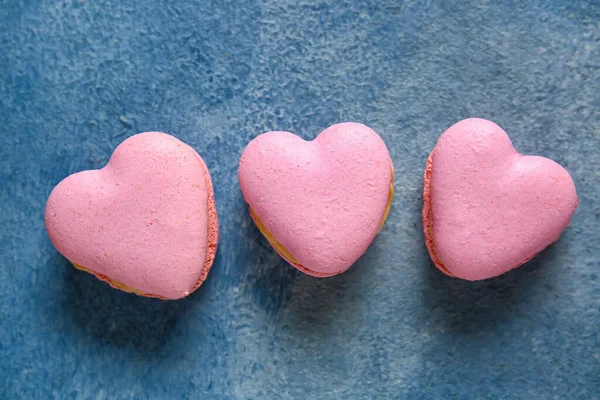 Tasty Heart Shaped Macaroons Blue Background — Stock Photo, Image