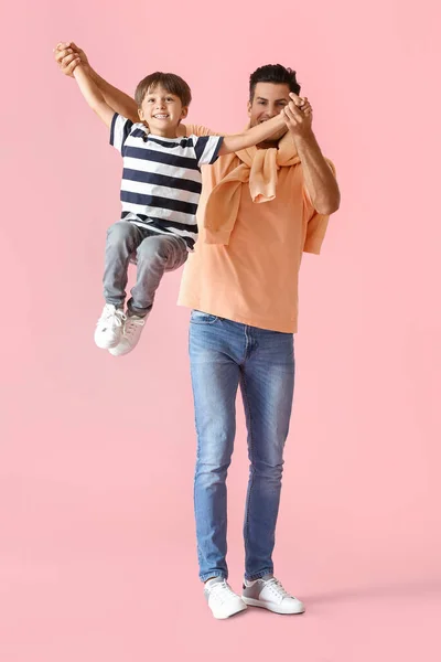 Happy Man Playing His Son Color Background — Stock Photo, Image