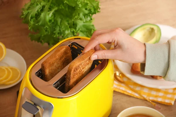 Woman Taking Bread Slice Yellow Toaster Kitchen Closeup — Stock Photo, Image