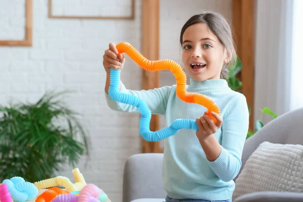 Little Girl Playing Pop Tubes Home — Stock Photo, Image
