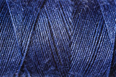 Arkaplan olarak mavi dikiş iplikleri