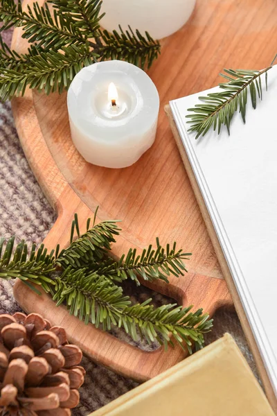 Wooden Tray Burning Candles Pine Cone Fir Tree Branches Books — Stock Photo, Image