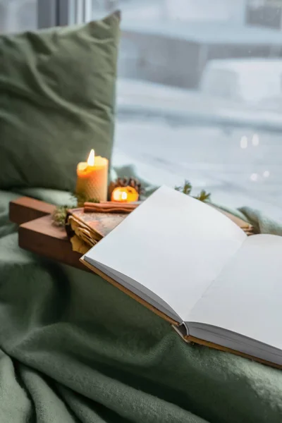 Opened Book Blank Pages Burning Candles Winter Decor Windowsill — Stock Photo, Image