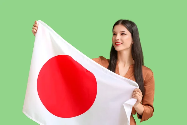 Wanita Muda Cantik Dengan Bendera Jepang Dengan Latar Belakang Warna — Stok Foto
