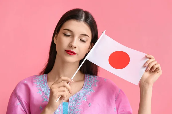 Jovem Bonita Com Bandeira Japão Fundo Cor — Fotografia de Stock
