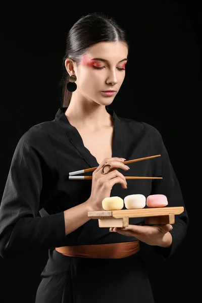 Beautiful Young Woman Tasty Japanese Mochi Black Background — Stock Photo, Image