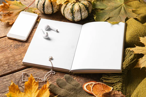 Blank Book Mobile Phone Earphones Autumn Decor Wooden Background — Stock Photo, Image