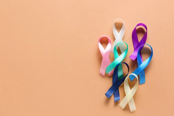 Fitas Consciência Diferentes Fundo Bege Dia Mundial Cancro — Fotografia de Stock