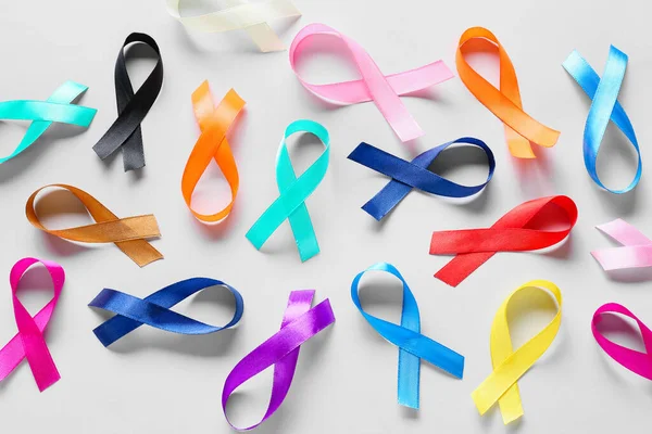 Different Awareness Ribbons Light Background World Cancer Day — Stock Photo, Image