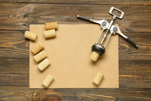 Blank Paper Sheet Opener Corks Wooden Background — Stock Photo, Image