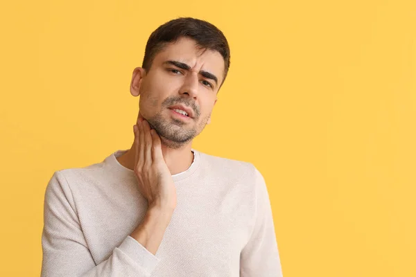 Ill Young Man Sore Throat Yellow Background — Stock Photo, Image