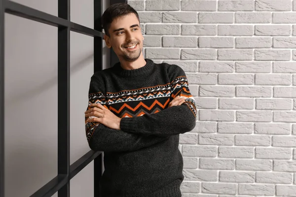 Handsome Young Man Knitted Sweater Grey Brick Wall — Stock Photo, Image