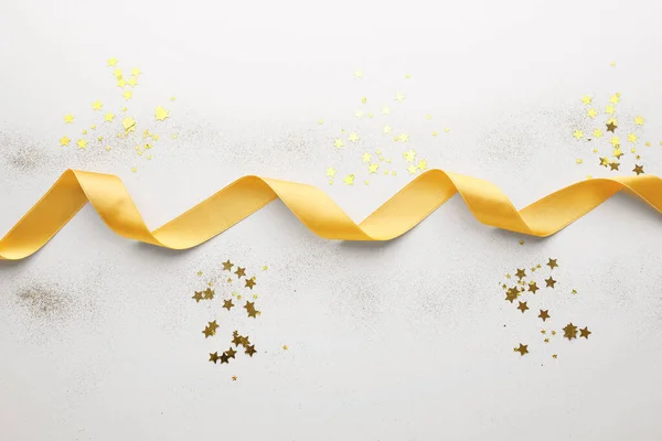 Golden Ribbon Glitters Light Background — Stock Photo, Image