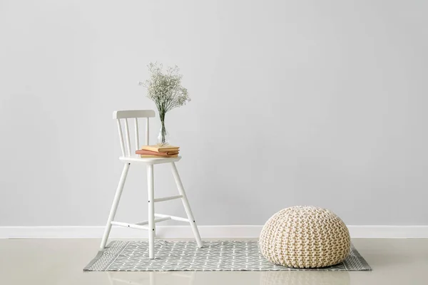 Books Vase Flowers Chair Pouf Light Wall Room — Stock Photo, Image