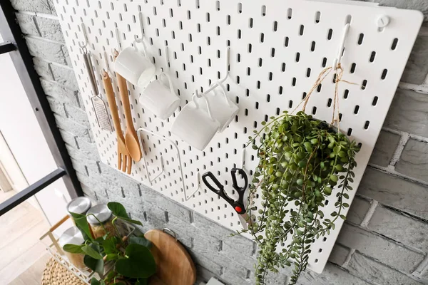 Pegboard Kitchenware Houseplant Grey Brick Wall — Stock Photo, Image