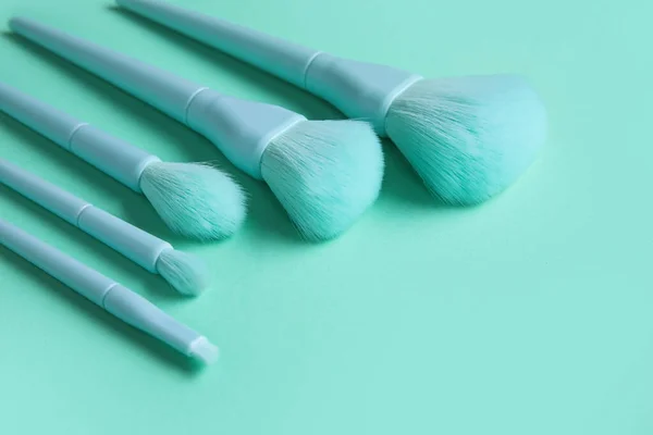 Set Makeup Brushes Turquoise Background Closeup — Stock Photo, Image