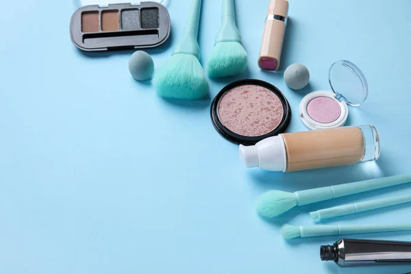 Diferentes Productos Maquillaje Sobre Fondo Azul —  Fotos de Stock