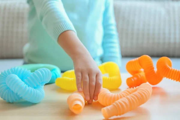 Little Girl Playing Pop Tubes Home Closeup — Stock Photo, Image