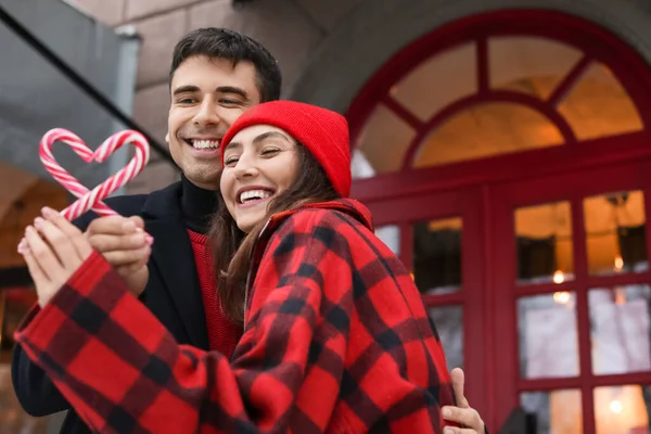 Loving Couple Candy Canes Winter Day — Stock Photo, Image