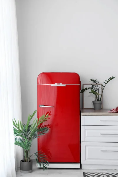 Stylish Red Refrigerator Houseplants Counter White Wall Kitchen — Stock Photo, Image