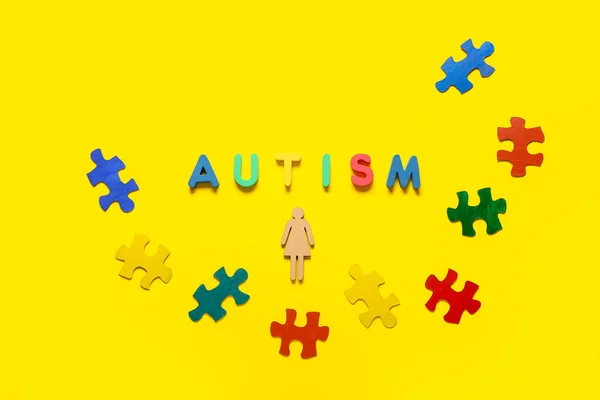 Word Autism Colorful Puzzle Pieces Human Figure Color Background — Stock Photo, Image