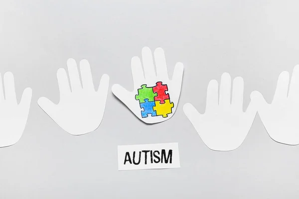Paper Human Palms Colorful Puzzle Pieces Word Autism Light Background — Stock Photo, Image