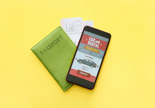 Mobile Phone Open Car Rent App Passport Yellow Background — Stock Photo, Image