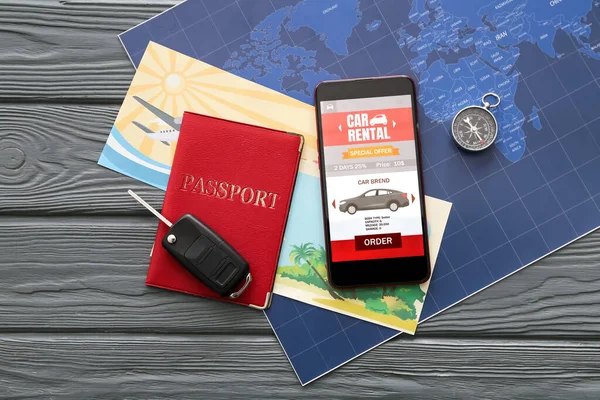 Mobile Phone Open Car Rent App Passport Compass Map Dark — Stock Photo, Image