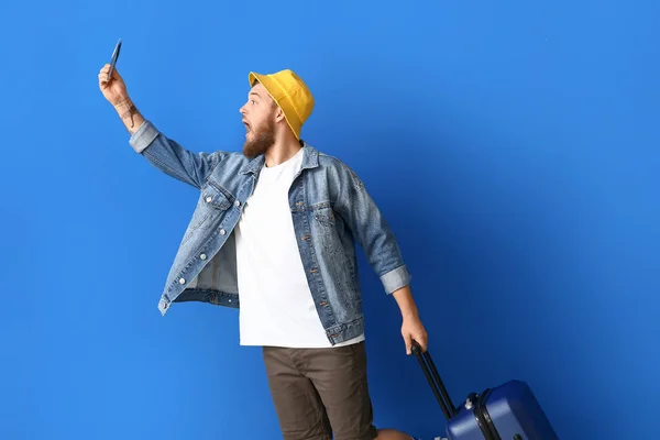 Handsome Young Man Passport Suitcase Blue Background — Stock Photo, Image