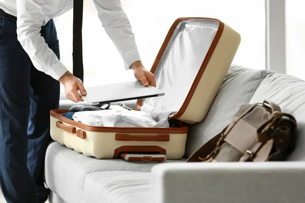 Young Businessman Packing His Laptop Suitcase Home — Stock Photo, Image