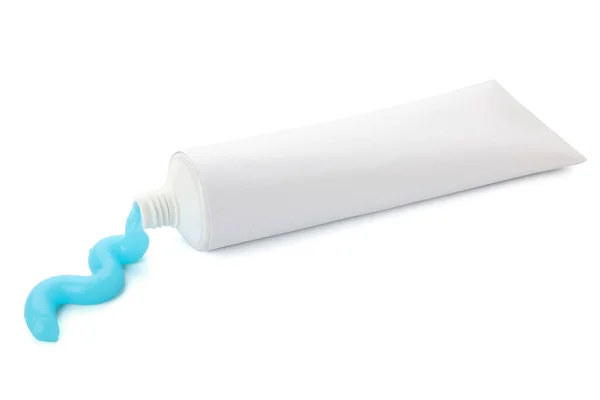白い背景に圧迫歯磨き粉とチューブ — ストック写真