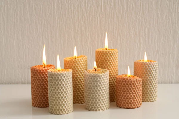 Beautiful Burning Candles Table White Wall — Stock Photo, Image