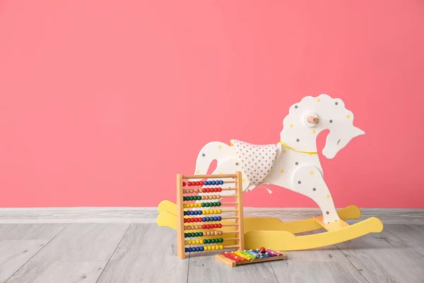 Rocking Horse Abacus Xylophone Color Wall — Stock Photo, Image