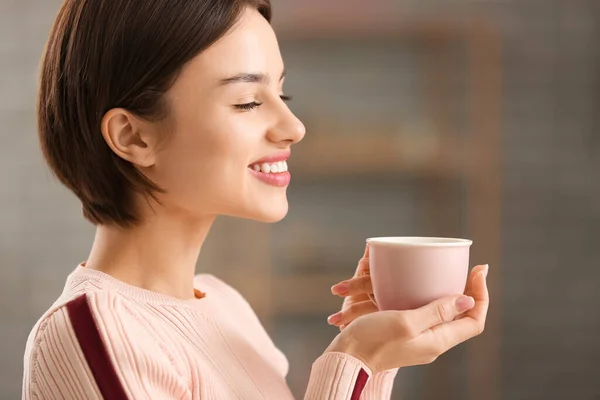 Beautiful Young Woman Drinking Tasty Tea Home — Stock Photo, Image