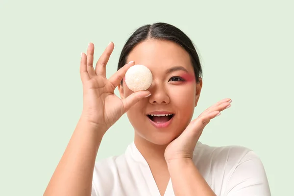 stock image Beautiful Asian woman with tasty Japanese mochi on color background