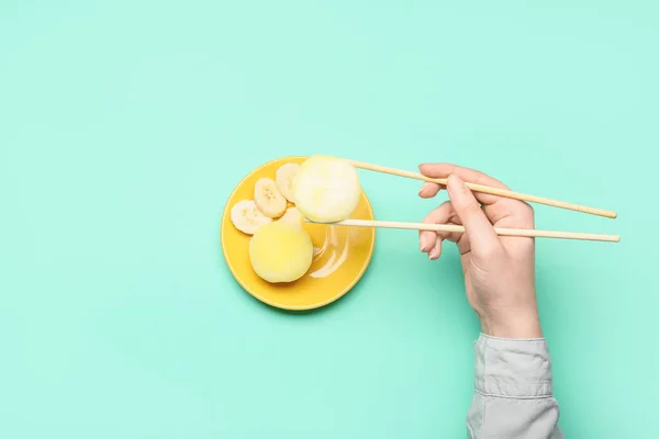 Woman Eating Delicious Mochi Chopsticks Color Background — Stock Photo, Image