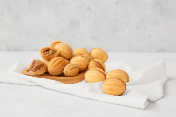 Wooden Board Tasty Walnut Shaped Cookies Boiled Condensed Milk Light — Stock Photo, Image