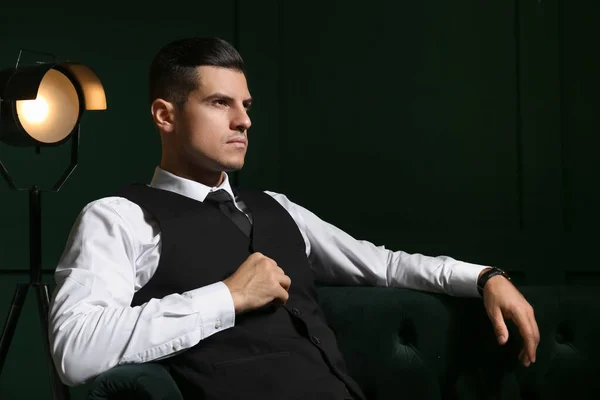 Fashionable Gentleman Sitting Sofa Dark Room — Stock Photo, Image