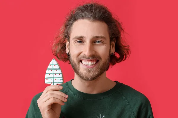 Happy Young Man Gingerbread Cookie Red Background — Stock Photo, Image