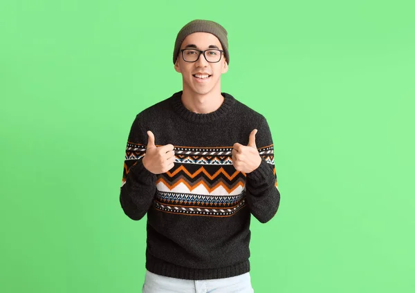 Handsome Young Asian Man Knitted Sweater Showing Thumb Green Background — Stock Photo, Image