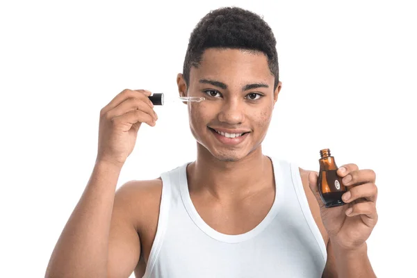Young African American Guy Serum Skin Care White Background — Stock Photo, Image