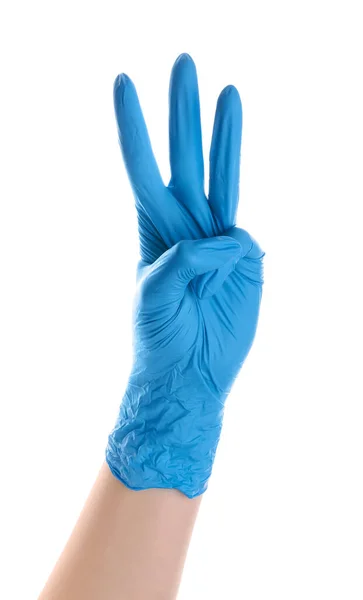 Kobieta Niebieskiej Rękawicy Medycznej Pokazuje Trzy Palce Białym Tle — Zdjęcie stockowe