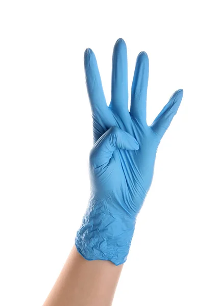 Kobieta Niebieskiej Rękawicy Medycznej Pokazuje Cztery Palce Białym Tle — Zdjęcie stockowe